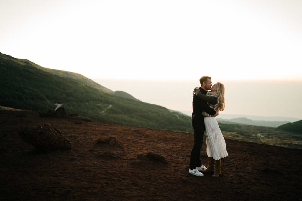 couple shooting at sunrise on mount etna